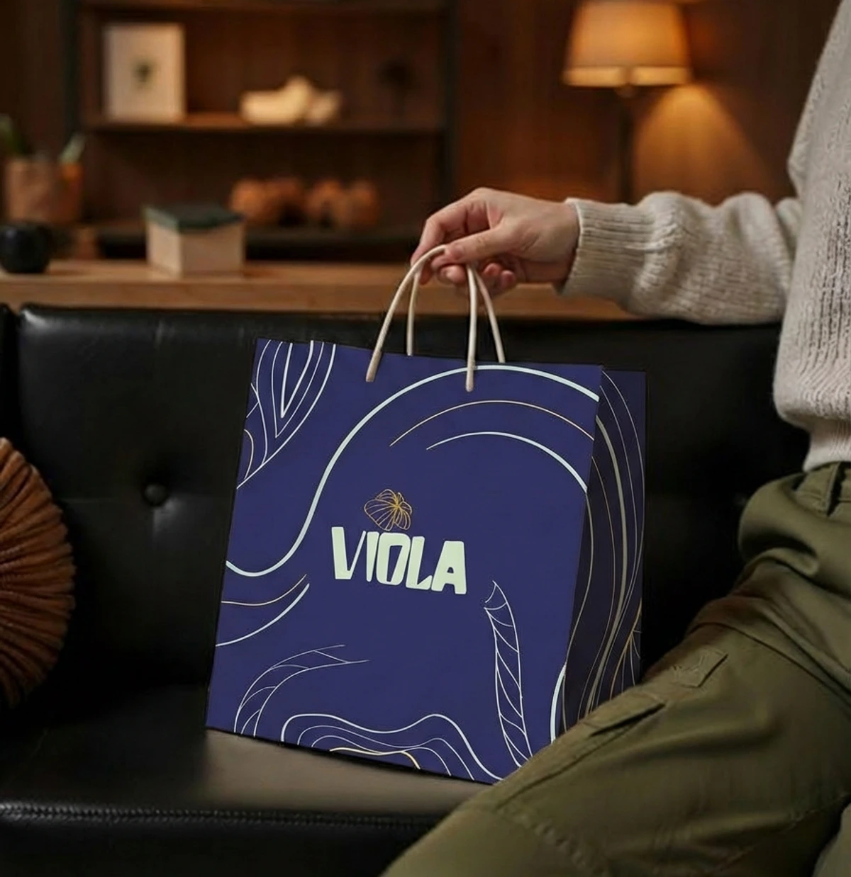 Viola packaging box held in hands